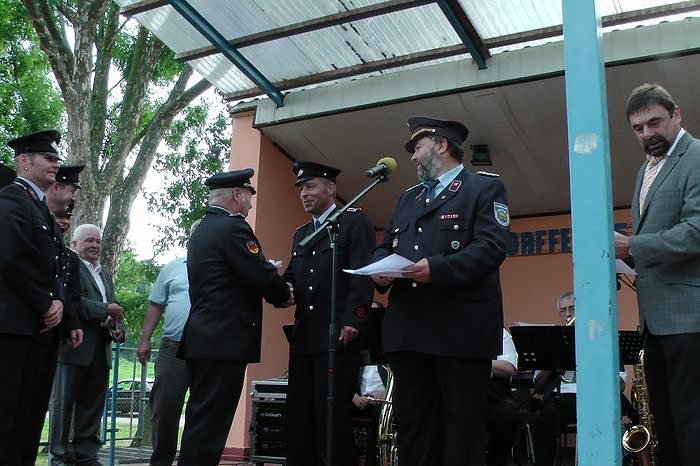 Auszeichnungen und Bef&ouml;rderungen